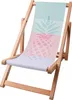 A wooden deck chair with a pineapple design on the fabric. Podgląd zdjęcia produktu