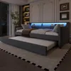 A modern bedroom with a daybed and pull-out trundle, featuring ambient LED lighting and a shelf. Anteprima dell’immagine prodotto