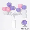 A string of decorative LED ball lights in pink, purple, and white, with a battery pack. Náhled obrázku produktu