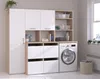 A laundry room cabinet set with a washing machine. Produktbild-Vorschau