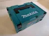 A teal and black toolbox with the Makita logo on top, placed on a light gray surface. Náhľad obrázku produktu