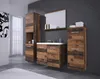 A modern bathroom vanity set with a sink, mirror, and tall cabinets made of reclaimed wood. Voir les images du produit
