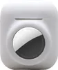 A white silicone case for AirPods and an AirTag, with the AirTag visible on the front. Náhled obrázku produktu
