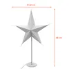 A white star-shaped lamp with small perforations, standing on a white base with a white pole. Dimensions are indicated by orange lines and text. Voir les images du produit