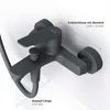 A dark gray bathtub faucet mounted on a white wall, with dimensions indicated by lines and text. Produktbild-Vorschau
