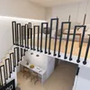 Interior view of a modern loft apartment with a U-shaped staircase and railing. Náhľad obrázku produktu