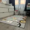 A child's bedroom with a rug and furniture. Produktbild-Vorschau