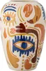 A close-up view of a decorative vase with abstract face-like patterns. Náhled obrázku produktu