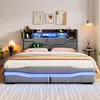 A modern bed with a headboard featuring shelves and LED lighting, set in a bedroom. Podgląd zdjęcia produktu