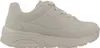 A side view of a beige sneaker against a white background. Voir les images du produit