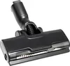 A close-up studio shot of a black vacuum cleaner floor brush attachment. Produktbild-Vorschau