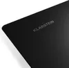 A close-up of a black induction cooktop with the brand name visible. Produktbild-Vorschau