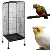 A bird cage and two parrots are shown against a white background. Náhled obrázku produktu