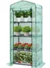 A green four-tier greenhouse filled with plants. Voir les images du produit