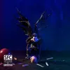 A collectible figure of Ryuk from Death Note, with an apple and bones scattered around him. Voir les images du produit