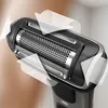 Close-up of the shaving head of a Philips body groomer, with transparent arrows indicating movement. Podgląd zdjęcia produktu