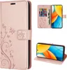 A collage of images showing a rose gold flip phone case with a floral design, including a view of the case open with cards and cash inserted, and a view of the phone in the case standing up. Produktbild-Vorschau