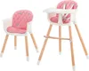 Two baby high chairs, one is a standard high chair and the other is a lower chair, both with pink cushions and wooden legs, on a white background. Produktbild-Vorschau