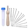 A set of felting needles and a storage tube. Produktbild-Vorschau