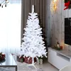 A white artificial Christmas tree is set up in a room with gifts underneath and decorations in the background. Produktbild-Vorschau