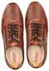 A top-down view of a pair of brown leather sneakers. Produktbild-Vorschau