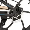 A close-up view of the rear disc brake assembly of a bicycle. Produktbild-Vorschau