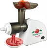 A tomato strainer processing tomatoes and producing tomato puree. Produktbild-Vorschau