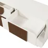 A close-up view of an open drawer in a white sideboard with brown slatted drawer fronts. Voir les images du produit