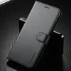 A black leather flip phone case is shown on a dark, textured surface. Produktbild-Vorschau