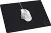 A white Logitech gaming mouse is placed on a black Logitech gaming mousepad. Voir les images du produit