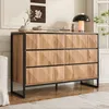A modern sideboard with a metal frame and six drawers, displayed in a well-lit room with a sofa and a lamp. Anteprima dell’immagine prodotto