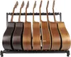 A rack of acoustic guitars. Náhled obrázku produktu