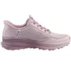 A side view of a pink athletic shoe. Anteprima dell’immagine prodotto