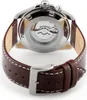 The back of a watch with a leather strap and a visible movement. Anteprima dell’immagine prodotto