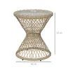 A rattan side table with dimensions indicated. Produktbild-Vorschau