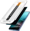 A screen protector kit for a smartphone, showing the screen protector, an alignment tool, and a smartphone. Anteprima dell’immagine prodotto