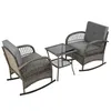 A three-piece rattan balcony set with two rocking chairs and a small table, shown on a white background. Podgląd zdjęcia produktu