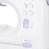 Close-up view of the control panel of a white mini sewing machine, showing various stitch selection dials, a lever, and a ruler. Produktbild-Vorschau