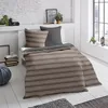 A neatly made bed with striped bedding in a bedroom setting. Produktbild-Vorschau