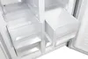 Interior view of an open refrigerator, showing empty drawers and shelves. Produktbild-Vorschau