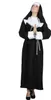 A woman dressed as a nun praying. Produktbild-Vorschau