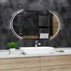 A modern bathroom vanity with a sink, faucet, and a large illuminated mirror. Produktbild-Vorschau