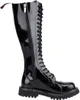 A black, knee-high boot with laces and a zipper. Náhľad obrázku produktu