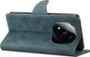 A blue leather flip case for a smartphone is shown from the side, with the case open to reveal the back of the phone and its camera module. Náhled obrázku produktu
