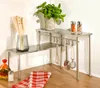 A kitchen corner shelf with various kitchen utensils and a plant. Produktbild-Vorschau