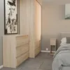 A bedroom scene with a dresser, wardrobe, and nightstand. Produktbild-Vorschau