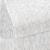 A close-up view of a textured rug. Produktbild-Vorschau