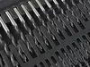 A close-up view of a set of drill bits and drivers organized in a black plastic case. Náhled obrázku produktu