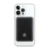 A white iPhone with a black power bank attached to the back. Náhled obrázku produktu