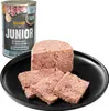 A can of dog food and a portion of the food served on a black plate. Produktbild-Vorschau
